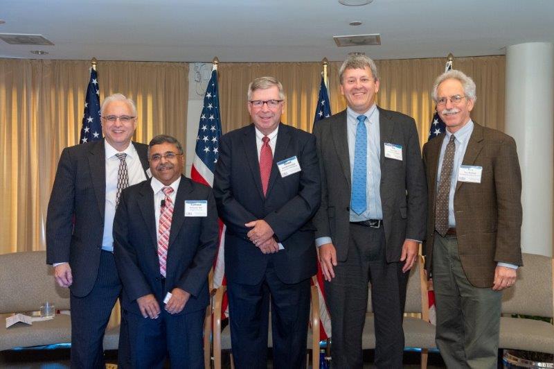 Sudhakar Neti poses with other conference attendees