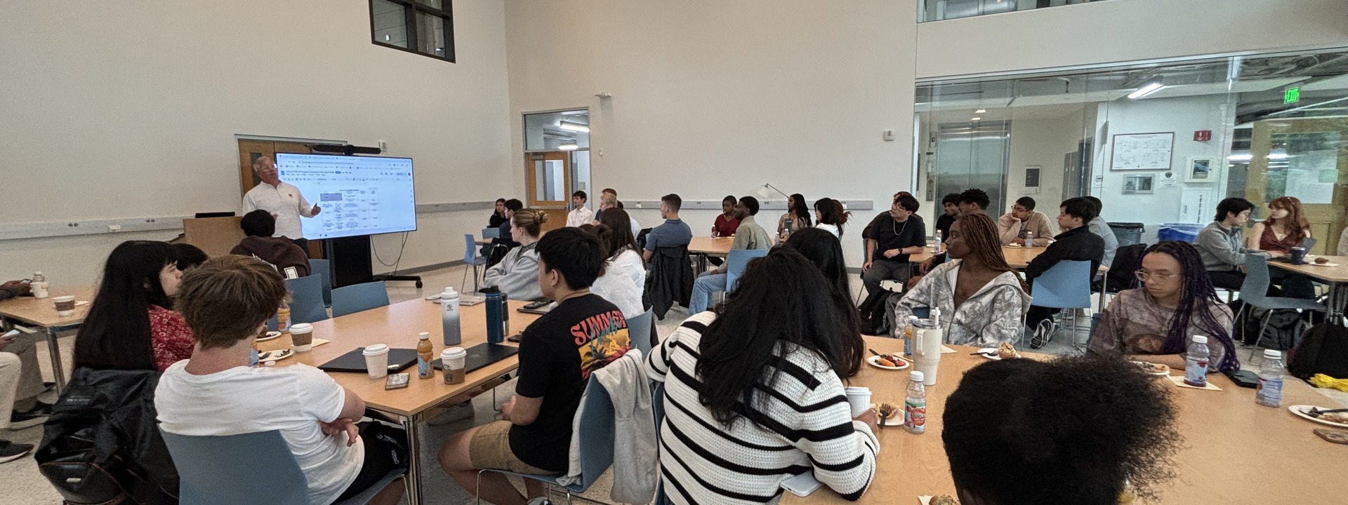 Chad Kusko talks to students