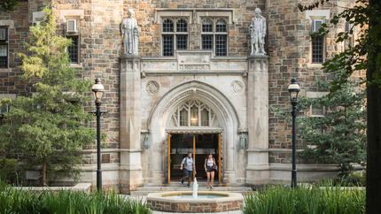 Entrance to Packard Lab with two students coming out of the doors