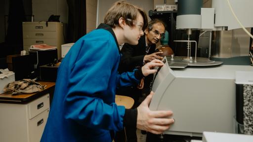 Professor Himanshu Jain, right, works with a student on research. Jain was founding director of I-FMD. Photo by ShotByAsgar